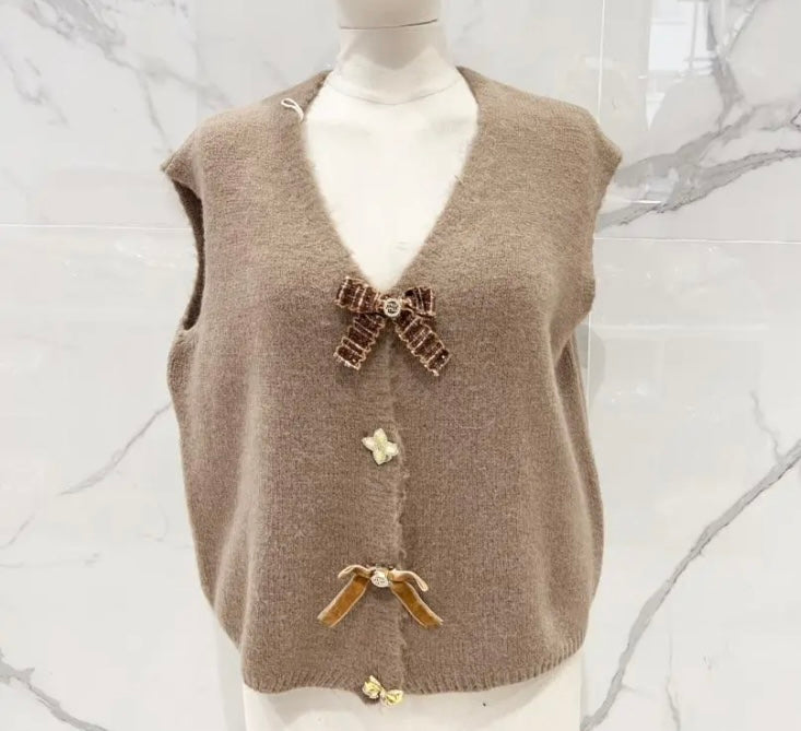 Cardigan met strikjes broches 🎀