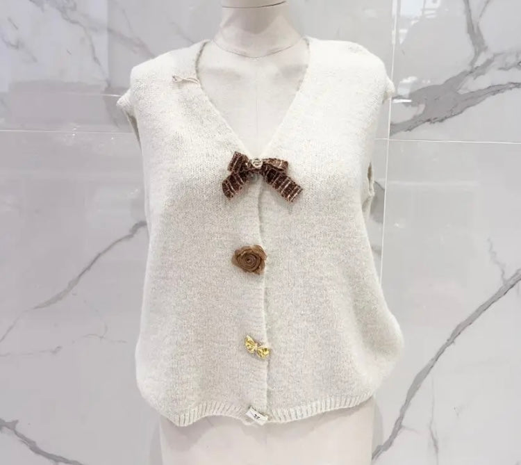 Cardigan met strikjes broches 🎀