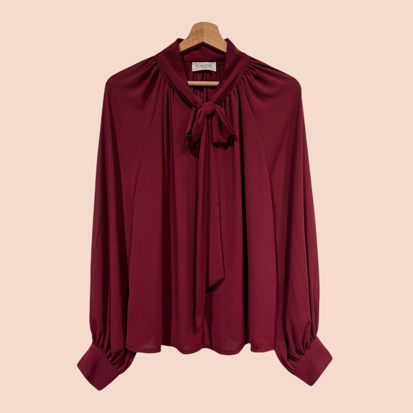 Chemise à manches longues fluide avec nœud au col