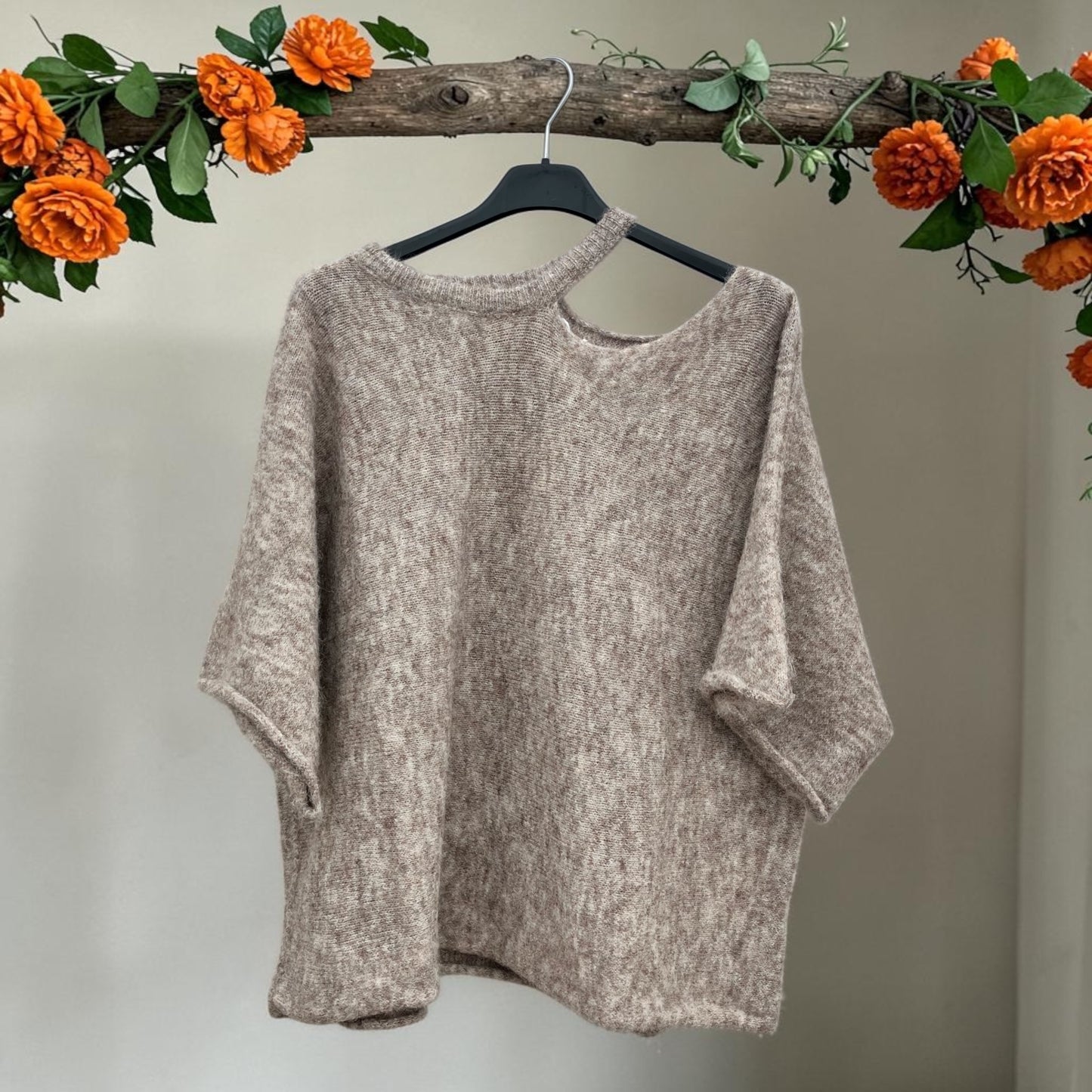 Pull maille avec découpe épaule