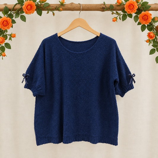 Pull  en mélange de laine alpaga avec nœud sur la manche