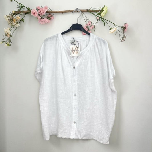 Top ample en gaze de coton effiloché