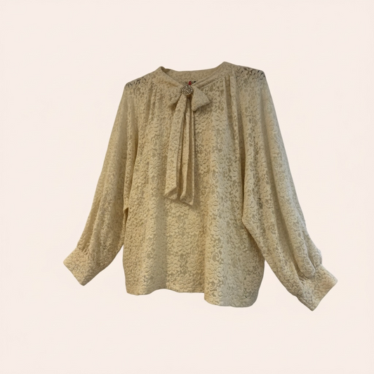 Chemisier doux avec broche