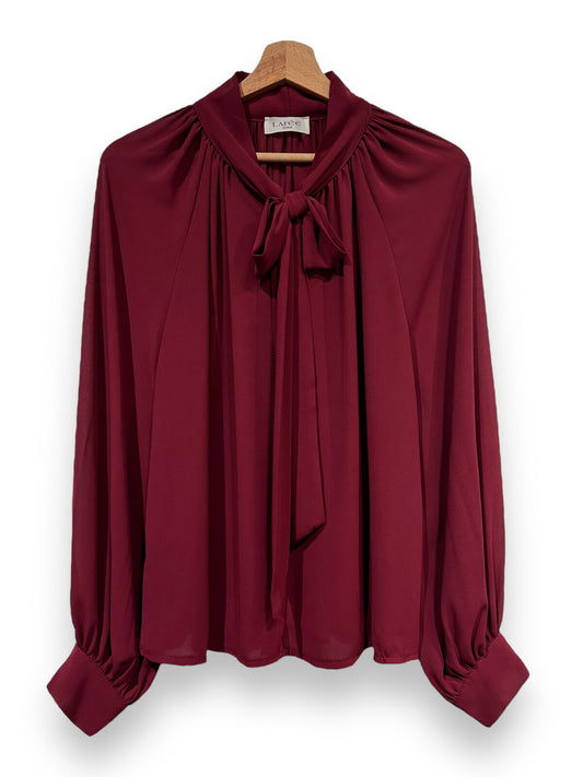 Chemise à manches longues fluide avec nœud au col